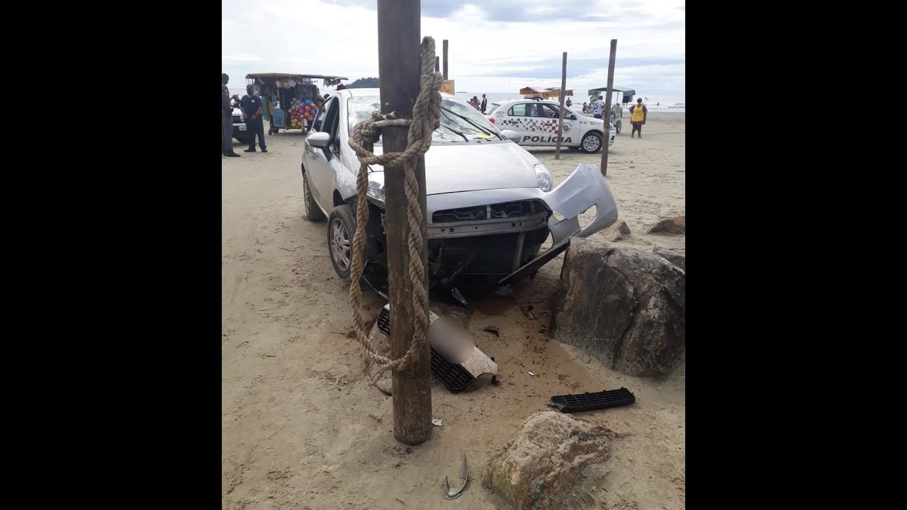 Mulher tem carro atacado ao invadir praia e tenta atropelar agressor no litoral de SP - YouTube